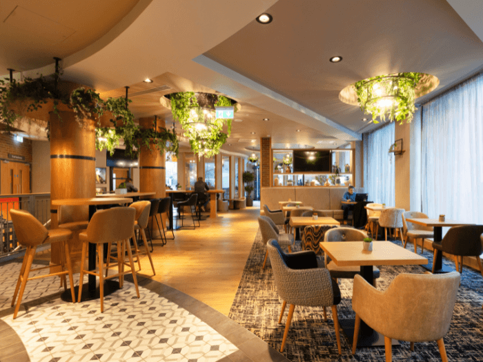 The inside of the hotel lobby of a Point A hotel.